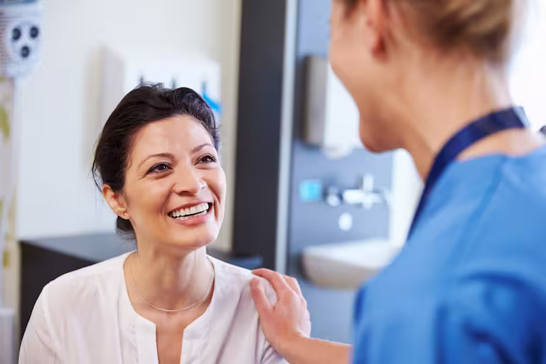 Smiling senior woman symbolizing health at Genfit